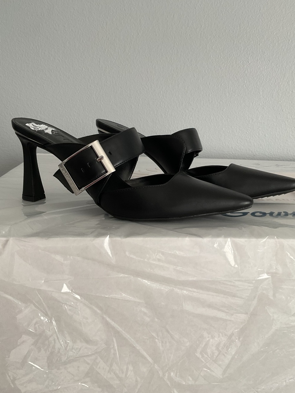 DKNY Nalani black heeled mules with silver buckle New